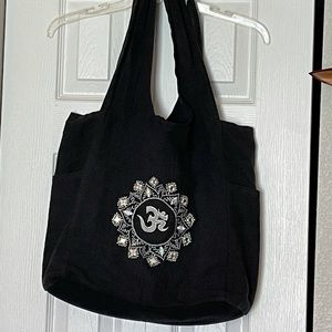 Black OM symbol purse
